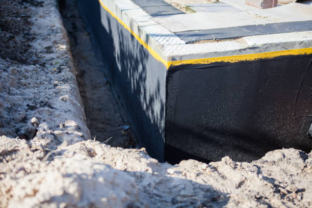 Professional Waterproofing technician working in Boston, VA